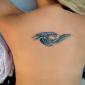 Значение татуировок: вода, волны, капли, роса Волны тату на плече женские